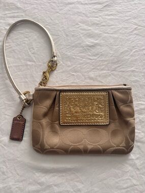 Coach Beige Signature Canvas Wristlet with Gold Plaque